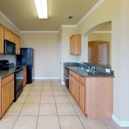 Rent this 4 bed apartment on 2943 Mclaren Drive in Southern Trace, College Station