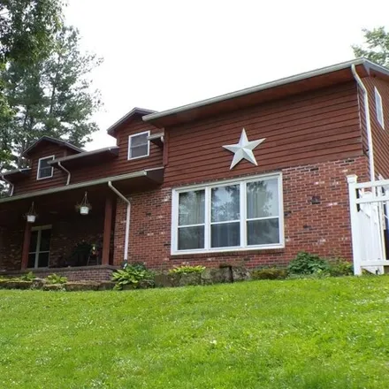 Buy this 4 bed house on 6332 Dallas Pike Rd in Triadelphia, West Virginia