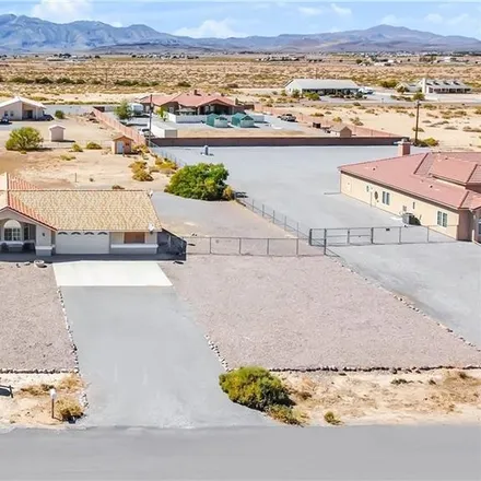 Buy this 4 bed house on 3850 South Vanguard Avenue in Pahrump, NV 89048