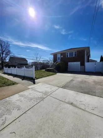 Rent this 3 bed house on 3098 Yost Boulevard in Oceanside, NY 11572