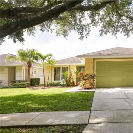 Rent this 4 bed house on 8550 Blue Horizon Court in Four Corners, FL 34747