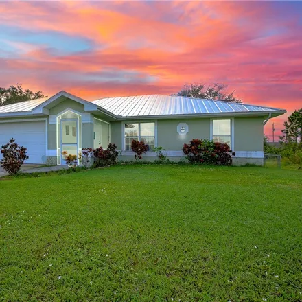 Buy this 3 bed house on 2511 19th Street Southwest in Lehigh Acres, FL 33976