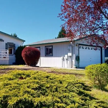 Buy this studio apartment on 1653 Sunglo Drive in Grants Pass, OR 97527