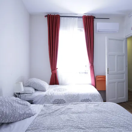 Rent this 8 bed room on Hostal Díaz in Calle de Atocha, 51