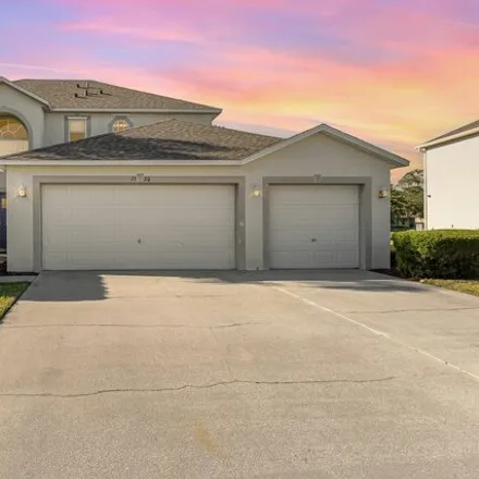 Buy this 4 bed house on 1506 Las Palmos Drive in Palm Bay, FL 32908
