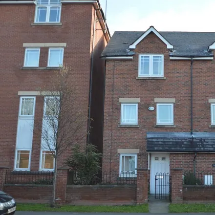 Rent this 4 bed townhouse on 145 Chorlton Road in Manchester, M15 4JG