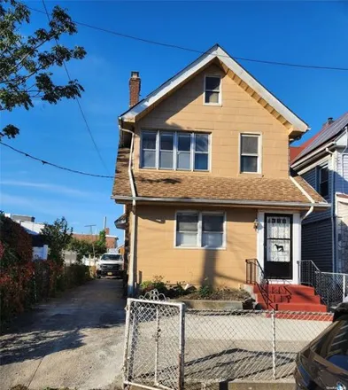 Buy this 4 bed house on 91-36 184th Street in Queens County, NY 11423