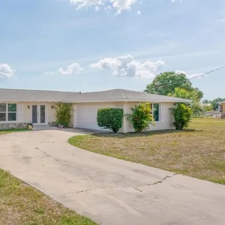 Rent this 3 bed house on 135 Leland St Se in Port Charlotte, Florida
