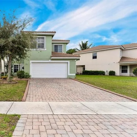 Buy this 4 bed house on 740 Perdido Heights Drive in Lake Belvedere Estates, Palm Beach County
