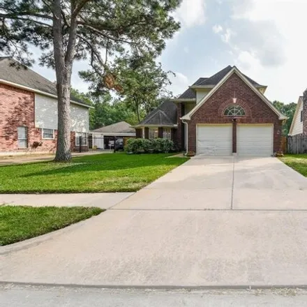 Buy this 4 bed house on 16841 Scenic Gardens Drive in Champion Forest, TX 77379