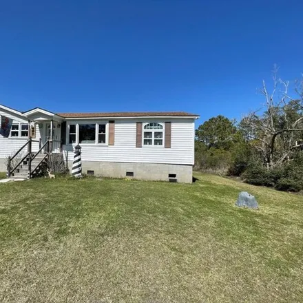 Buy this 2 bed house on Highway 70 Sea Level in Carteret County, NC 28511