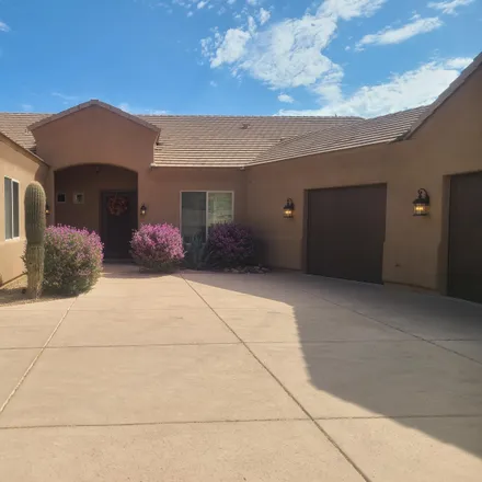 Rent this 4 bed house on 5913 West Thunder Cloud Drive in Pinal County, AZ 85142