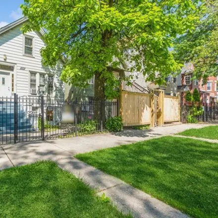Buy this 3 bed house on 1824 North Saint Louis Avenue in Chicago, IL 60647