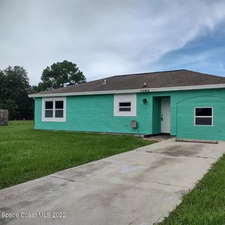 Rent this 4 bed house on 1184 Yager Road Southeast in Palm Bay, FL 32909