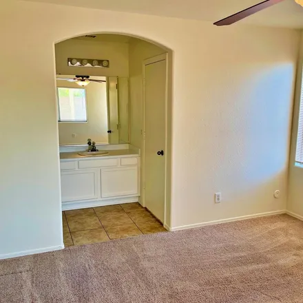 Rent this 3 bed apartment on 12930 West Sharon Drive in El Mirage, AZ 85335