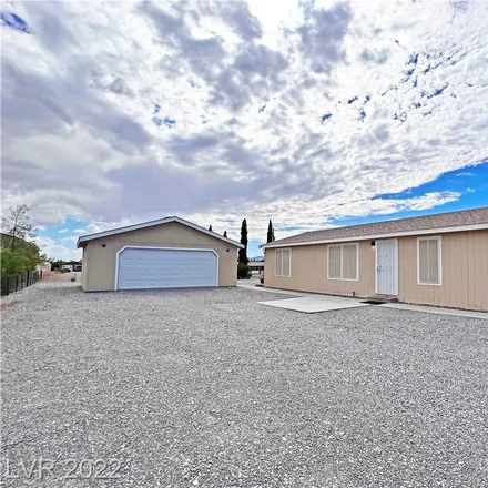 Buy this 3 bed house on 631 East Fehrs Way in Pahrump, NV 89060