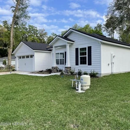 Rent this 4 bed house on 3421 Buck Head Road in Pineland Gardens, Jacksonville