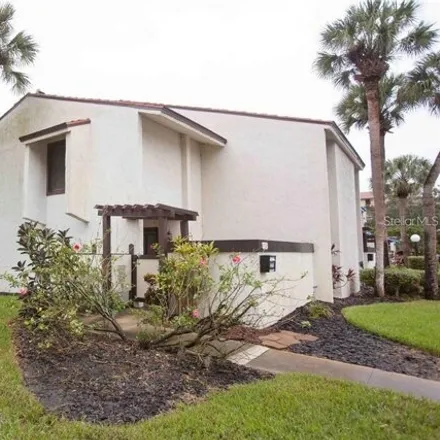 Rent this 4 bed townhouse on 4066 Player Circle in Orlando, FL 32808