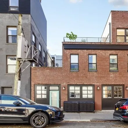Buy this 2 bed townhouse on 164 West 9th Street in New York, NY 11231