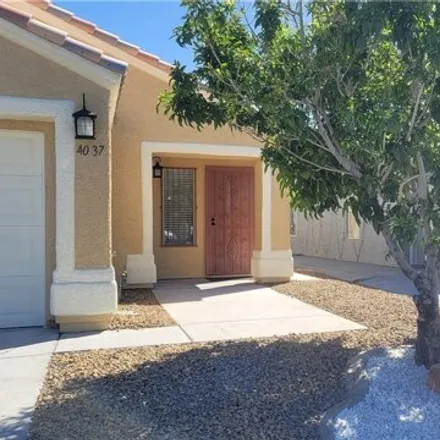 Rent this 3 bed house on 4042 Tully Avenue in Las Vegas, NV 89110