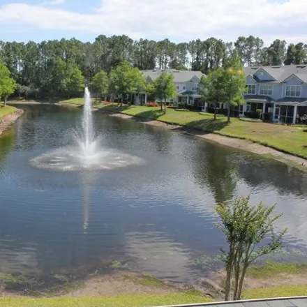 Buy this 3 bed townhouse on 13360 Stone Pond Drive in Jacksonville, FL 32224