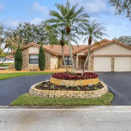 Buy this 4 bed house on 11154 Northwest 1st Court in Coral Springs, FL 33071