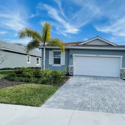 Rent this 3 bed house on Asana Court in North Port, FL