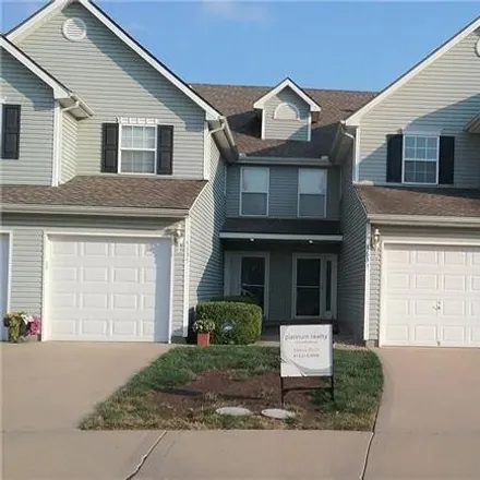 Buy this 2 bed townhouse on Northeast 83rd Street in Kansas City, MO 64156