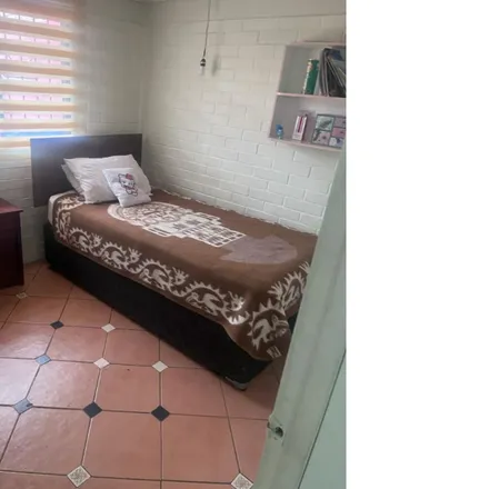 Buy this 3 bed house on Escuela Básica La Araucaria de Maipú in Avenida Nueva San Martín 2285, 925 2307 Provincia de Santiago