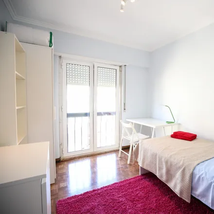 Rent this 4 bed room on Rua da Beneficência in 1600-033 Lisbon, Portugal