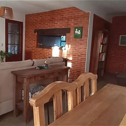 Buy this 4 bed house on Calle 303 in Partido de Berazategui, 1884 Ranelagh