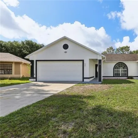 Buy this 4 bed house on 656 Jaguar Ct in Poinciana, Florida