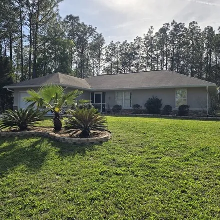 Buy this 3 bed house on 7130 North Cricket Drive in Citrus Springs, FL 34434