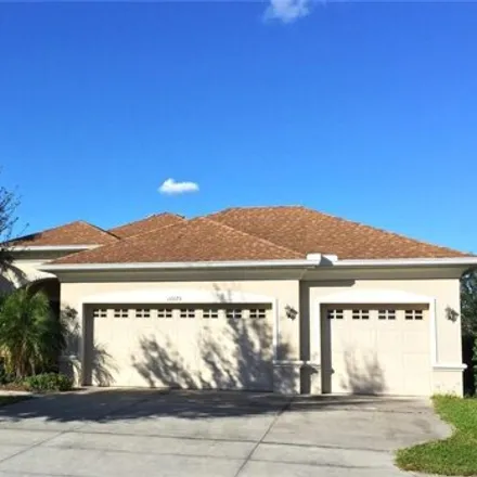 Rent this 4 bed house on 12075 Aster Ave in Bradenton, Florida