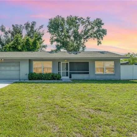 Buy this 3 bed house on 712 NE 17th Pl in Cape Coral, Florida