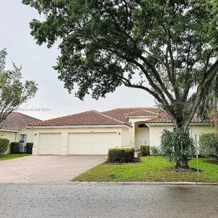 Buy this 4 bed house on 4998 Northwest 53rd Avenue in Coconut Creek, FL 33073