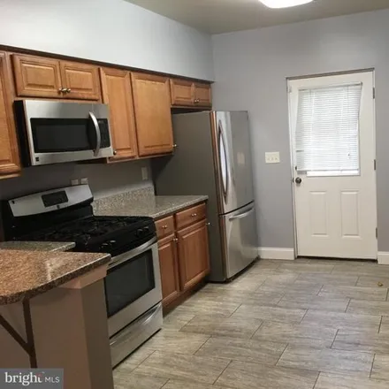 Rent this 3 bed house on 1740 Fleet Street in Baltimore, MD 21231