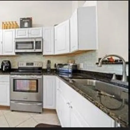 Image 2 - 911 Northwest 46th Street, Fort Lauderdale, FL 33309, USA - Condo for sale