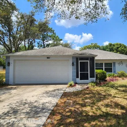 Buy this 3 bed house on 12363 Baxley Street in Spring Hill, FL 34609