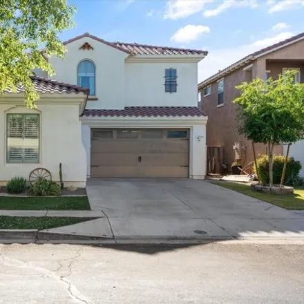 Buy this 5 bed house on 1317 South Ponderosa Drive in Gilbert, AZ 85296