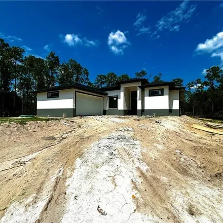 Buy this 3 bed house on 902 Canton Ave in Lehigh Acres, Florida