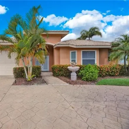 Rent this 4 bed house on 28450 Del Lago Way in Preserve at Woods Edge, Bonita Springs
