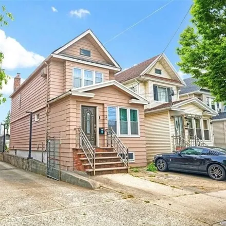 Buy this 3 bed house on 85-25 124th Street in New York, NY 11415