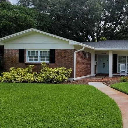 Rent this 4 bed house on 11207 Carrollwood Drive in Mullis City, FL 33618