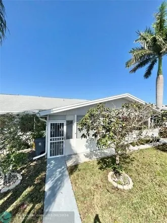 Rent this 2 bed house on 3417 Christopher Street in Cypress Lakes, Palm Beach County