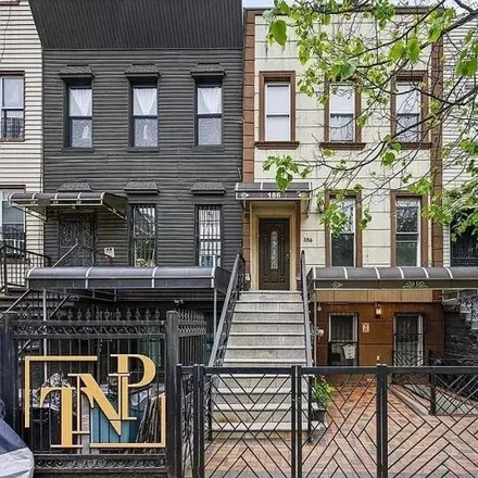 Buy this 7 bed house on 186 Covert Street in New York, NY 11207