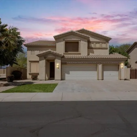 Buy this 4 bed house on 14700 West Amelia Avenue in Goodyear, AZ 85395