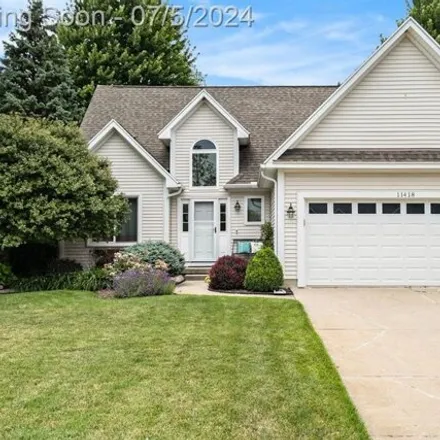 Buy this 3 bed house on 11418 Rolling Meadow Dr in Fenton, Michigan