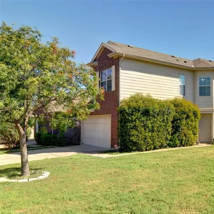 Buy this 3 bed townhouse on 7508 Lazy Spur Boulevard in Fort Worth, TX 76131