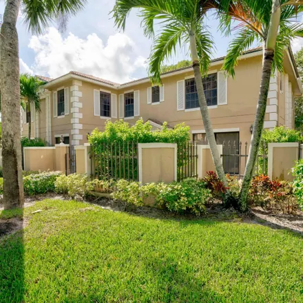 Buy this 2 bed townhouse on Prestwick Circle in Palm Beach Gardens, FL 33418